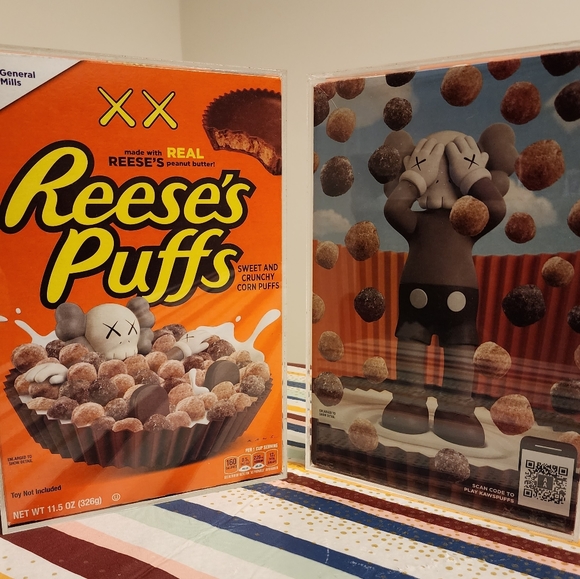 Reese's Puffs - KAWS Cereal In Display Case - Picture 1 of 3